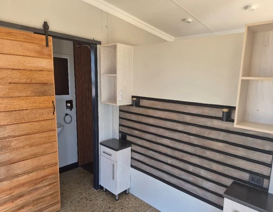 Entrance detail with timber sliding door